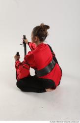 Katerina Ninja Kneeling Pose